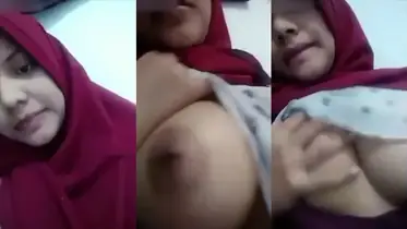 Bokep Jilbab Merah Ukhti Pamer Toket Gede Menggoda poster